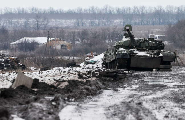 DONETSK REGION, UKRAINE - MARCH 4, 2022: A damaged T-72B1 tank is seen near the village of Viktorovka after it was taken